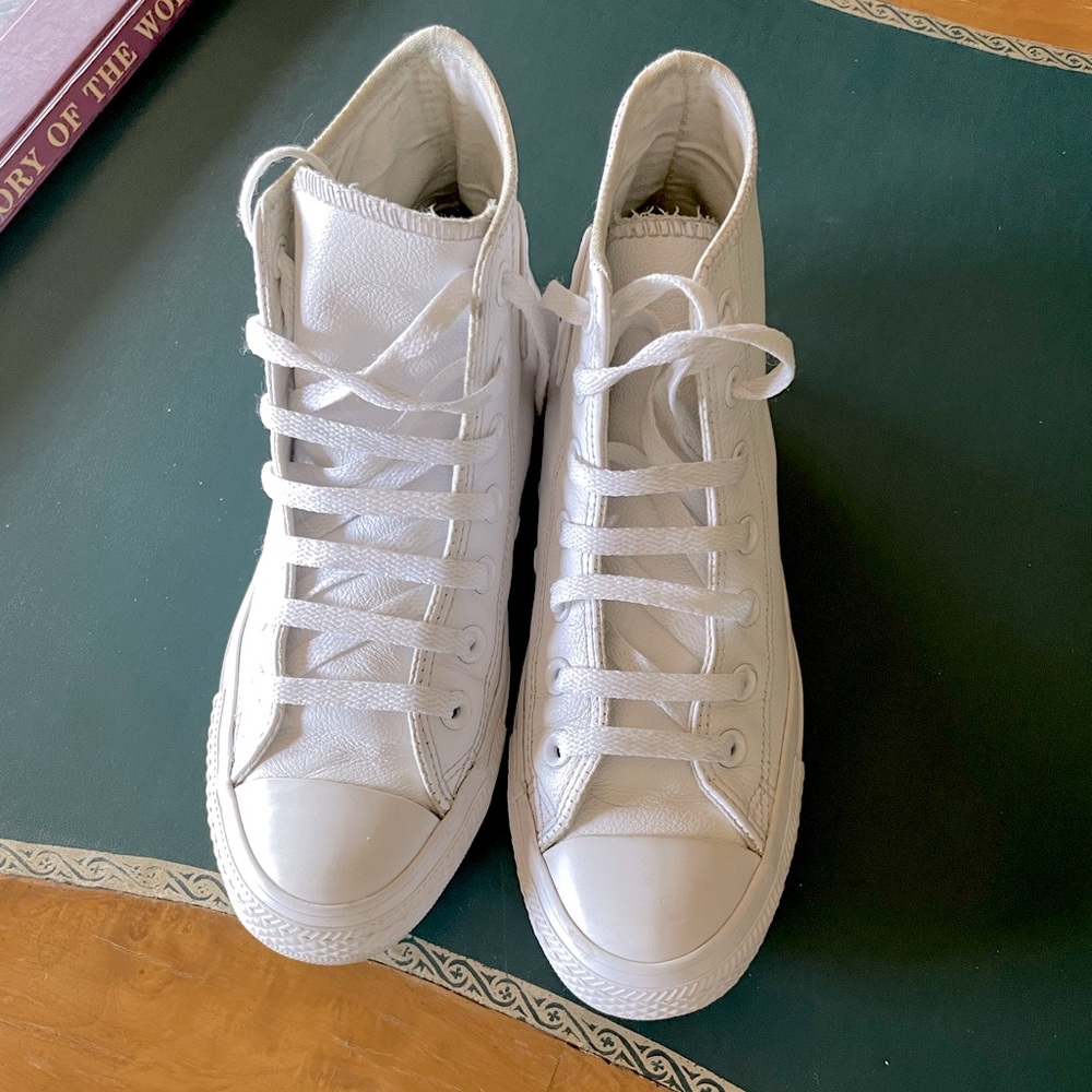 All white leather high top converse